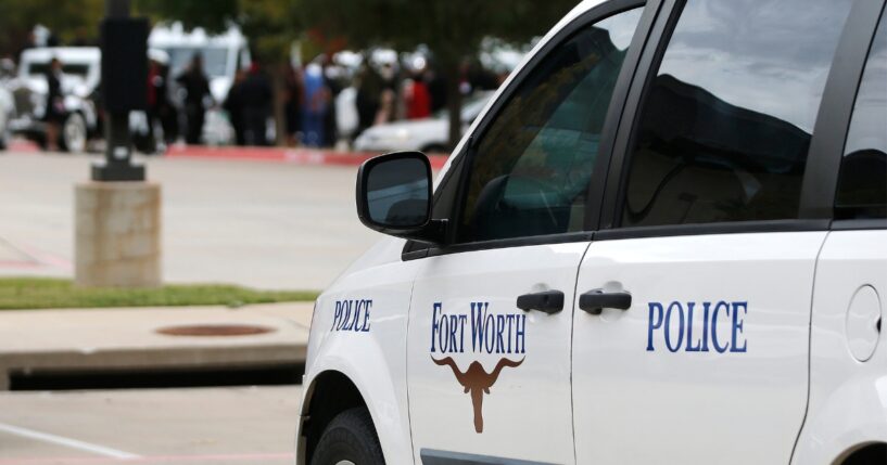 A Fort Worth Police car is parked outside the funeral service for Atatiana Jefferson on Oct. 24, 2019, at Concord Church in Dallas, Texas.