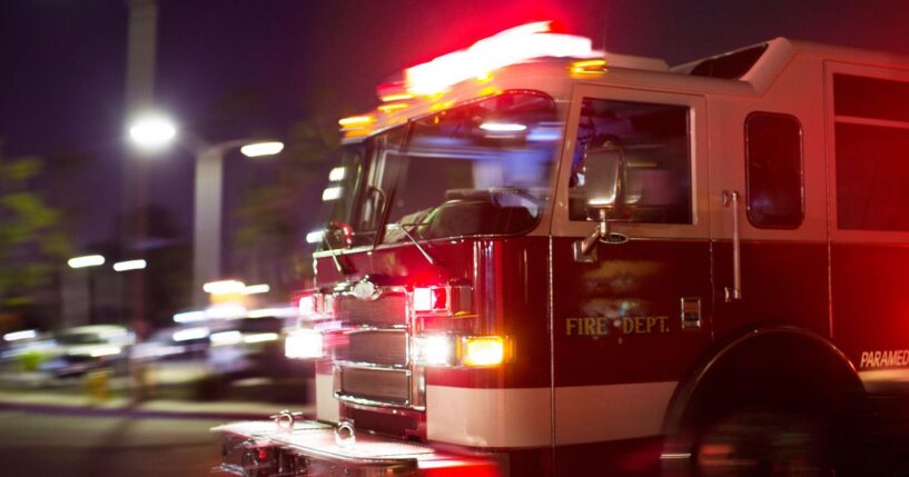 A firetruck races to the scene of an accident.