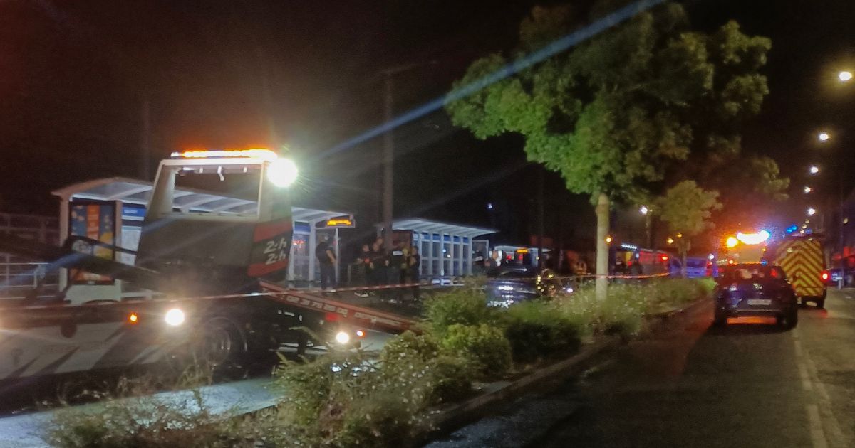 Police officials investigate the scene where a man drove a car into a group of people in the north-western French city of Caen late Wednesday.