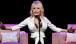 Dolly Parton, seen in a 2025 photo, later expressed regret for locking away a "really good" song in a time capsule that won't be opened until 2045.