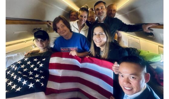 Secretary of State Marco Rubio shared a photo of Robert Gilman, left, on his flight home.