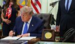 President Donald Trump signs an executive order in the Oval Office on August 10, 2026 in Washington, D.C.