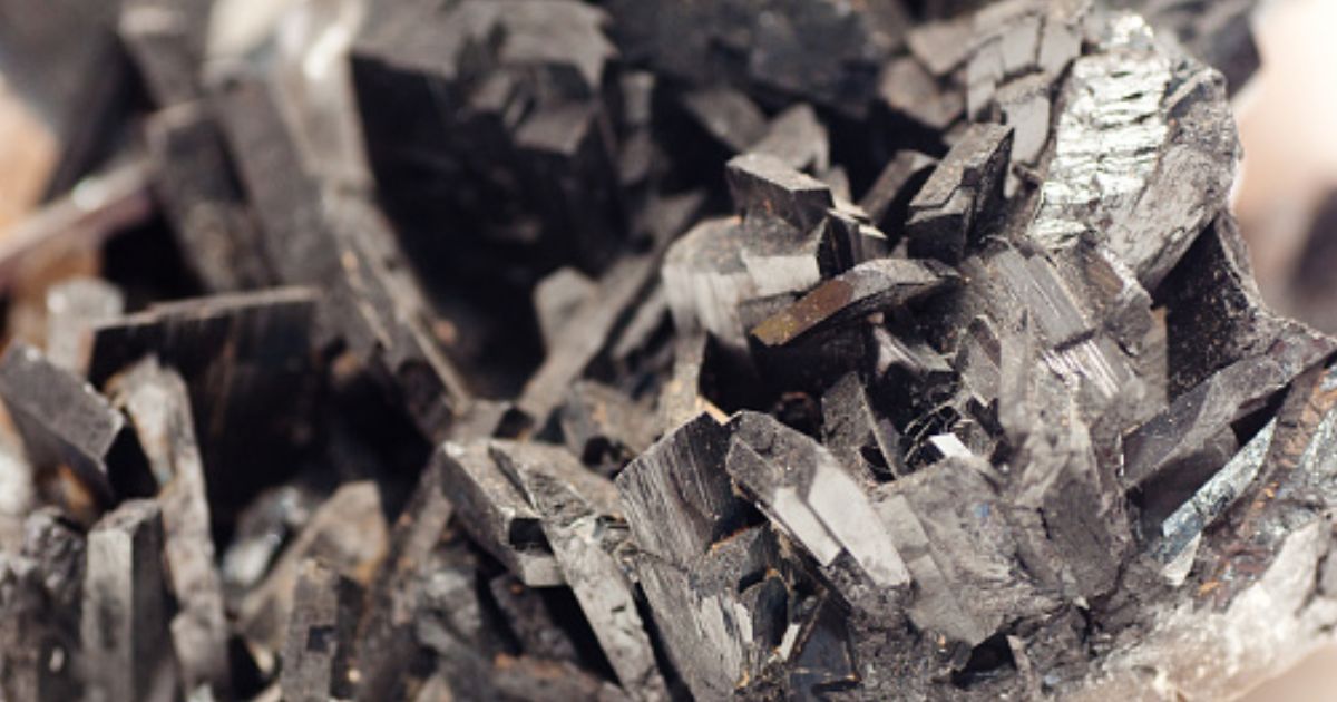 The metal substance Tungsten is pictured under light.