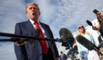 President Donald J. Trump stands near Air Force One in the Joint Base Andrews, Maryland on August 21, 2026.