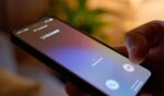 A phone screens displays an unknown caller.