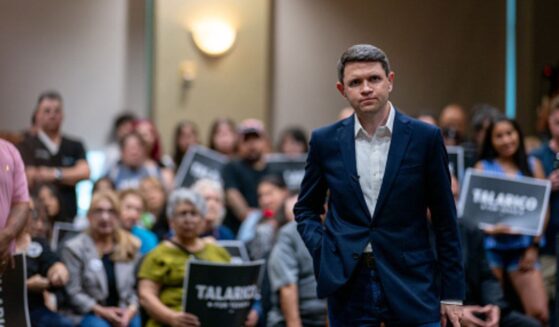 James Talarico, Democratic Senatorial candidate, stands looking defeated with a crowd on July 13, 2026 in Eagle Pass, Texas.