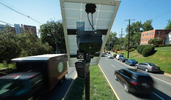 A Flock camera can be viewed above a street in Silver Spring, Maryland on August 19, 2026.
