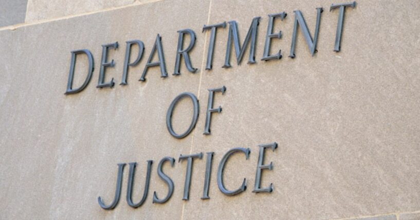 The Department of Justice logo can be viewed on the side of the Justice Department Headquarters in Washington, D.C. on August 8, 2026.