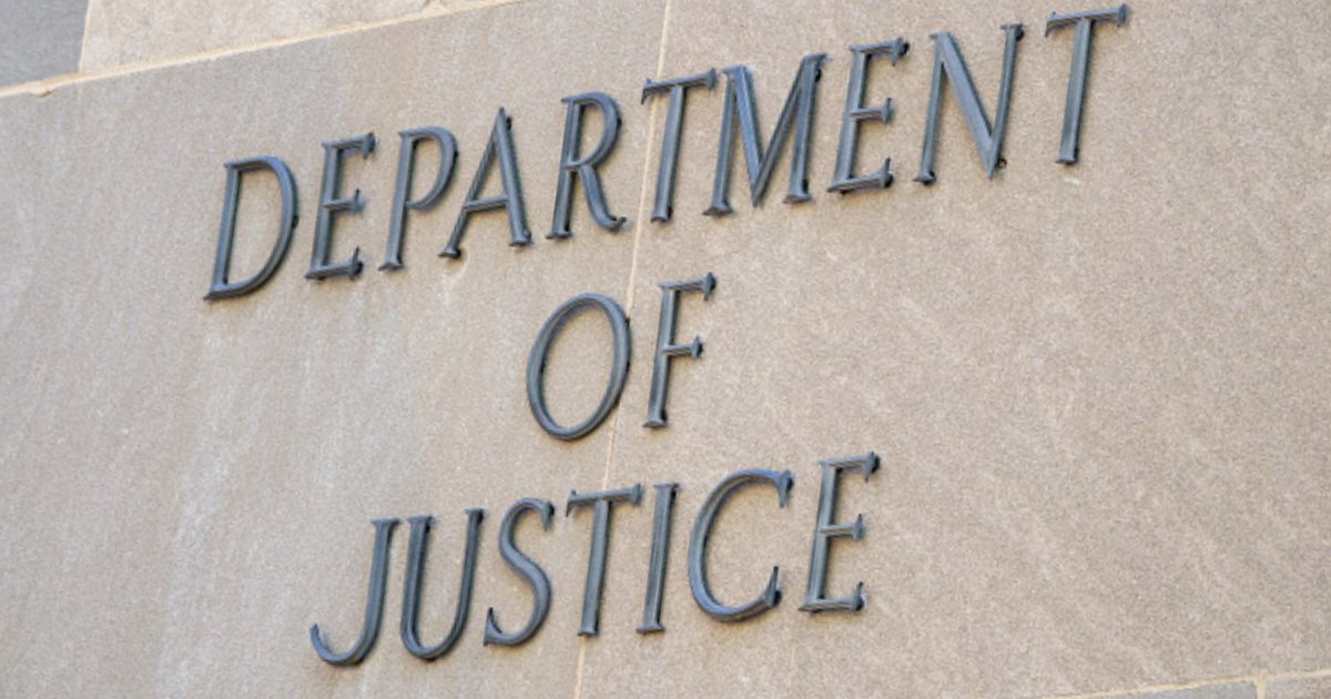 The Department of Justice logo can be viewed on the side of the Justice Department Headquarters in Washington, D.C. on August 8, 2026.