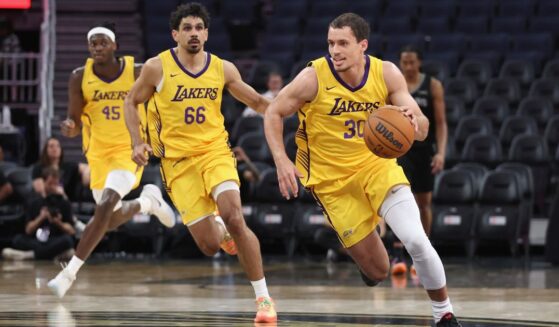 Chris Manon #30 of the Los Angeles Lakers dribbles the ball up court against the San Antonio Spurs at Chase Center on July 6 in San Francisco, California.