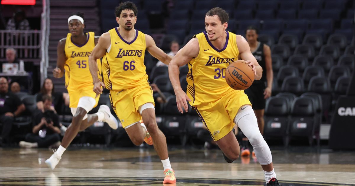 Chris Manon #30 of the Los Angeles Lakers dribbles the ball up court against the San Antonio Spurs at Chase Center on July 6 in San Francisco, California.