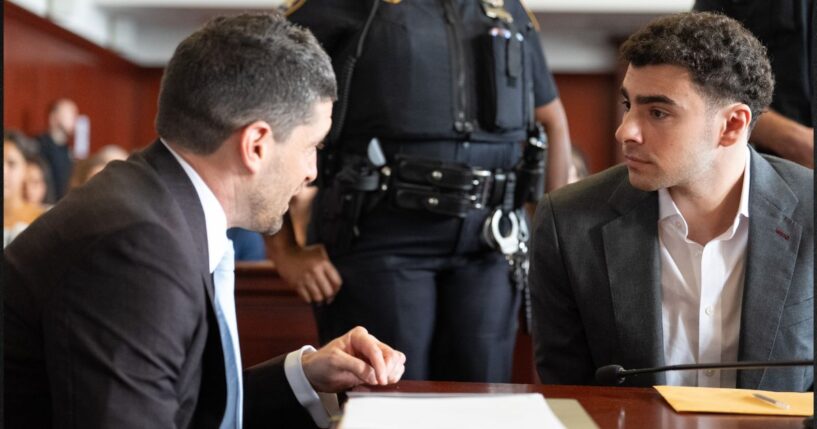 Luigi Mangione, right, attends a pre-trial appearance Tuesday in Manhattan Criminal Court in New York City.