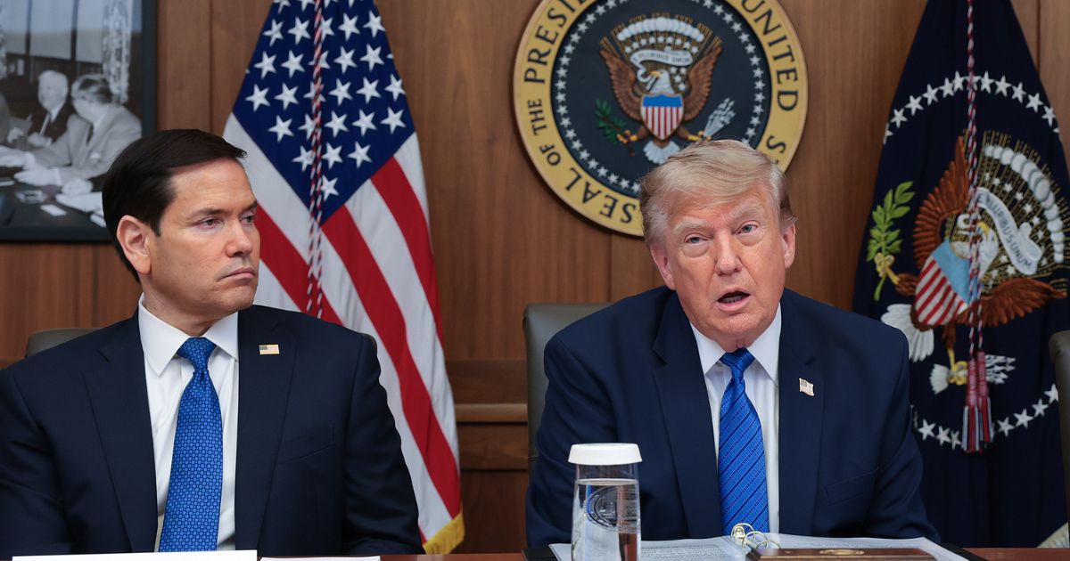 President Donald Trump, pictured with Secretary of State Marco Rubio, left, speaks during a July 31 Cabinet meeting at Camp David, the presidential retreat in Maryland.