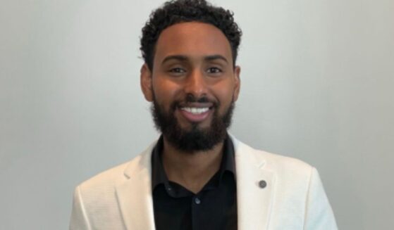 Salman Ahmed Elmi was celebrated as 'Outstanding Refugee' at the same time he was reportedly running fraudulent social services, along with a sex trafficking ring.