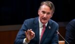 Former Virginia Governor Glenn Youngkin speaks at a roundtable discussion at the Department of Justice on June 11, 2026 in Washington.