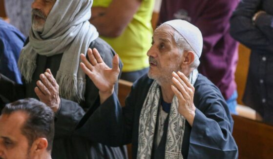 Coptic Christians in worship at a Palm Sunday service in Cairo, Egypt on April 5, 2026.