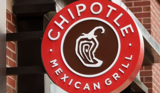 A sign for a local Chipotle location in Washington, DC on July 20, 2026.