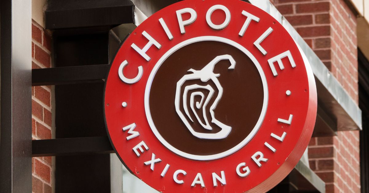A sign for a local Chipotle location in Washington, DC on July 20, 2026.