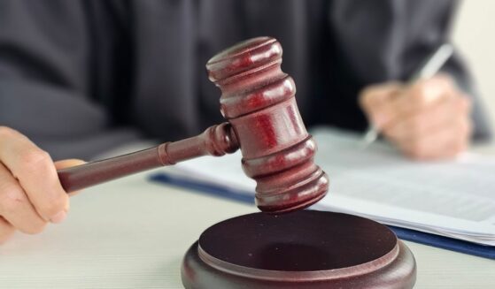 A judge presides over a courtroom.