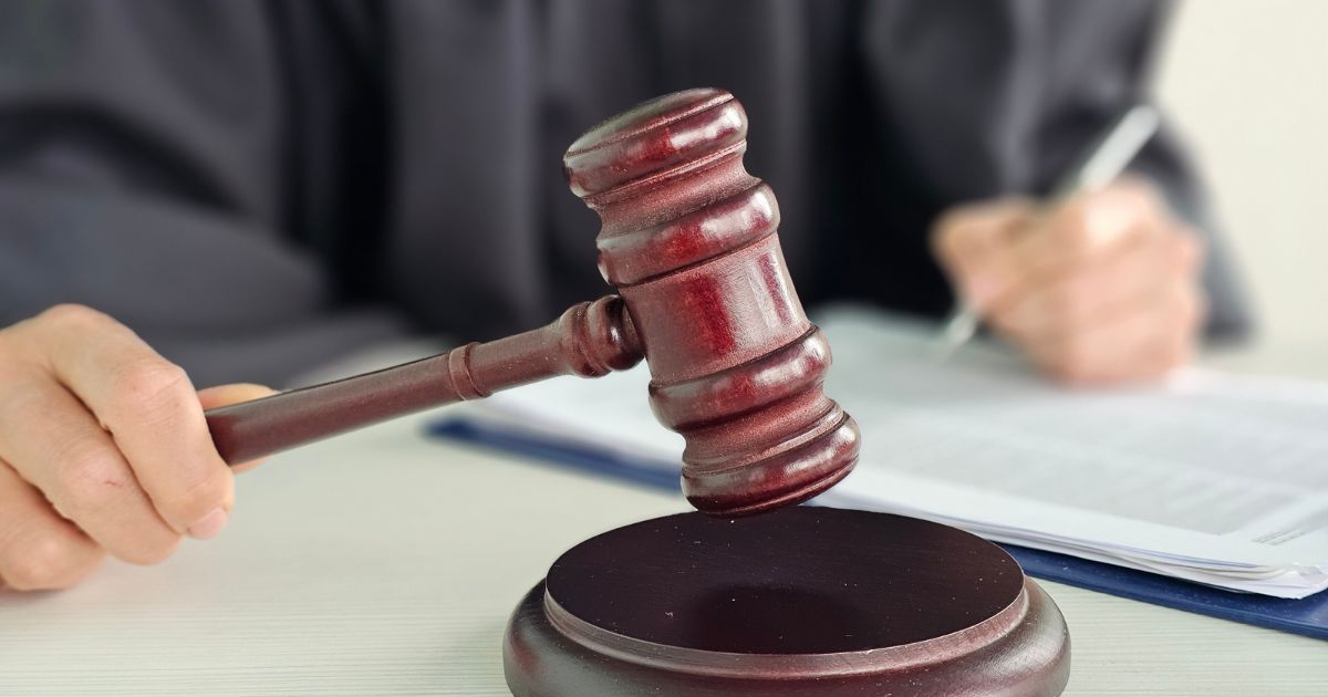 A judge presides over a courtroom.