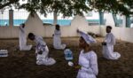Christian worshippers pray at the Celestial Church of Christ international headquarters in Lagos, Nigeria on July 12, 2026.
