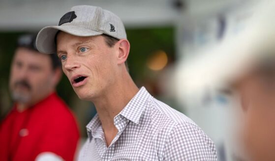 Rob Sand , who is the Democratic nominee for Iowa governor, speaks to the media at the Iowa State Fair Saturday in Des Moines, Iowa.
