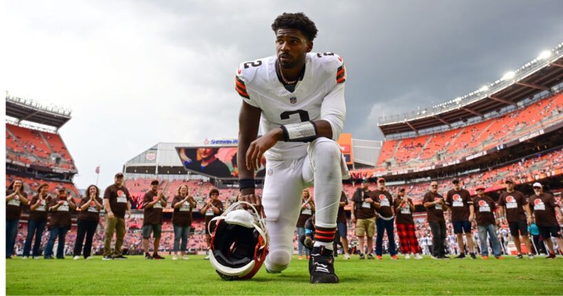 Shedeur Sanders #2 of the Cleveland Browns kneels to pray Saturday before a preseason game against the Buffalo Bills at Huntington Bank Field in Cleveland, Ohio.