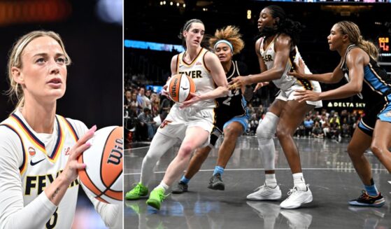 Sophie Cunningham, left, #8 of the Indiana Fever prepares to shoot a free throw and Caitlin Clark, at right, #22 of the Indiana Fever drives to the basket as Te-Hina Paopao #2 and Naz Hillmon #00 of the Atlanta Dream play defense during the overtime Sunday at State Farm Arena in Atlanta, Georgia.