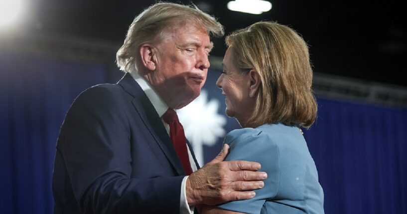 President Donald Trump hugs U.S. Sen. Darline Graham at an Aug. 21 campaign rally for Graham in Myrtle Beach, South Carolina.