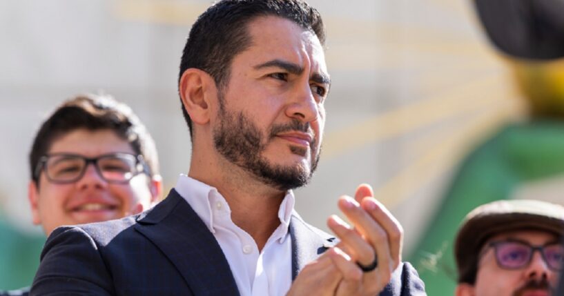 Michigan Democratic Senate primary winner Abdul El-Sayed claps during a news conference Wednesday after his victory over Rep. Haley Stevens.