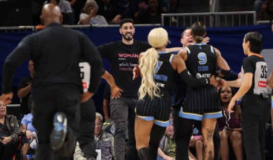 Former NBA player Enes Kanter Freedom has a courtside clash with the WNBA's Natasha Cloud during a Chicago Sky-Indiana Fever game in Chicago on Sunday. Kanter Freedom was ejected from Chicago's Wintrust Arena.