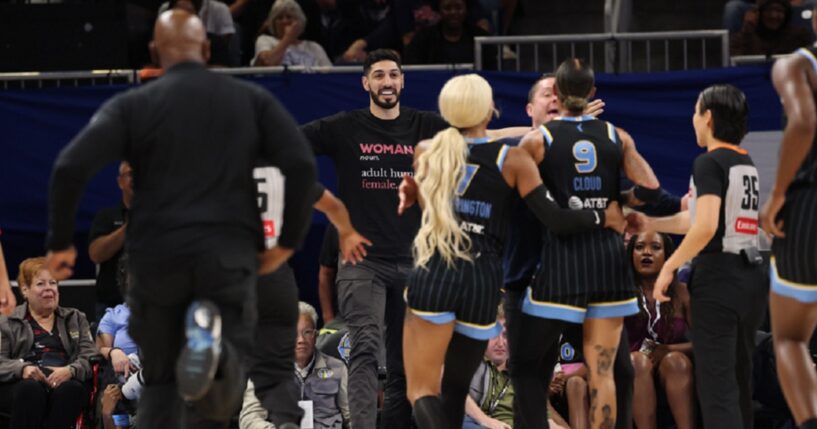 Former NBA player Enes Kanter Freedom has a courtside clash with the WNBA's Natasha Cloud during a Chicago Sky-Indiana Fever game in Chicago on Sunday. Kanter Freedom was ejected from Chicago's Wintrust Arena.