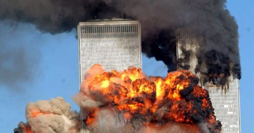 Fire and smoke surround the Twin Towers of New York City's World Trade Center during the terrorist attack of Sept. 11, 2001.