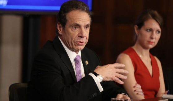 Then-New York Governor Andrew Cuomo, left, speaks at a 2020 news conference in New York City, accompanied by Secretary to the Governor Melissa DeRosa, right.