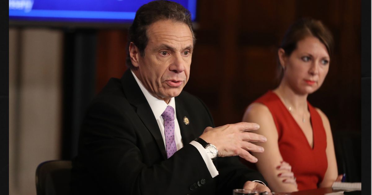 Then-New York Governor Andrew Cuomo, left, speaks at a 2020 news conference in New York City, accompanied by Secretary to the Governor Melissa DeRosa, right.