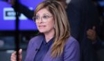 Fox Business anchor Maria Bartiromo speaks on the floor of the New York Stock Exchange during morning trading on July 1 in New York City.