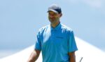 Former NFL football player Tony Romo reacts after making a putt on the 17th green during Round One of the 2022 American Century Championship at Edgewood Tahoe Golf Course on July 8, 2022, in Stateline, Nevada.