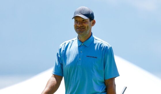 Former NFL football player Tony Romo reacts after making a putt on the 17th green during Round One of the 2022 American Century Championship at Edgewood Tahoe Golf Course on July 8, 2022, in Stateline, Nevada.