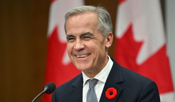 Canadian Prime Minister Mark Carney smiles during a press conference after the 2025 Asia-Pacific Economic Cooperation Economic Leaders' Meeting in Gyeongju on Nov. 1, 2025.