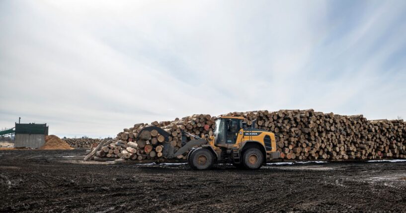 Wood for processing is stacked at the C.A. Spencer sawmill on April 10, 2025, in Lachute, Canada.
