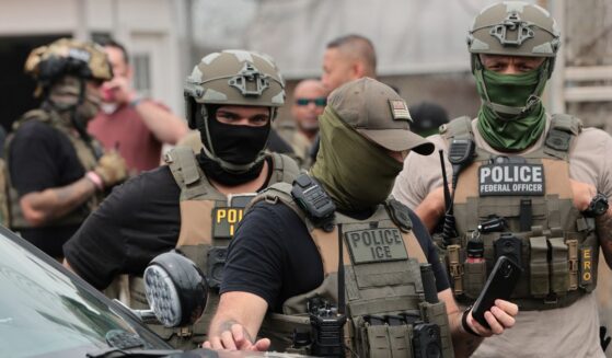 Immigration and Customs Enforcement agents stand guard in front of protesters outside Delaney Hall which is being used as an Immigration and Customs Enforcement detention center on May 27, 2026, in Newark, New Jersey.