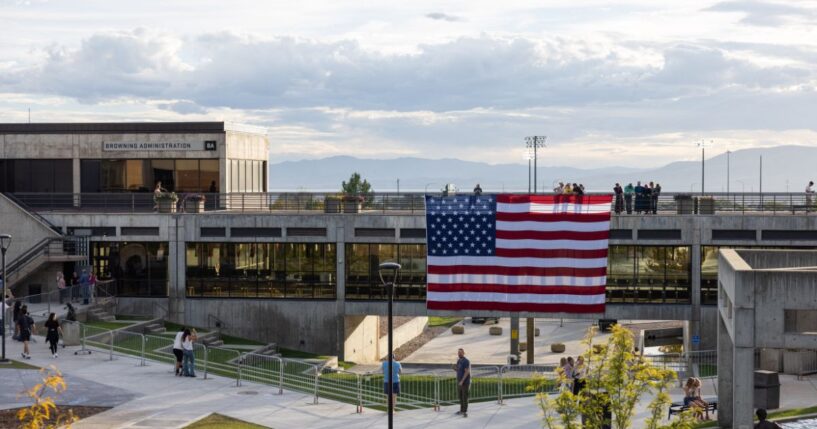 A flag is displayed in memory of right-wing political activist Charlie Kirk at the main campus of Utah Valley University in Orem, Utah, on Sept. 19, 2025.