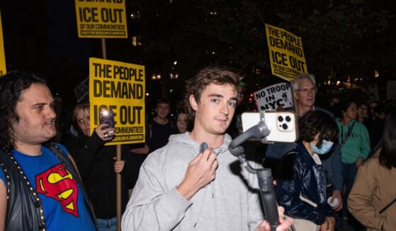 Conservative influencer Nick Shirley films protestors demonstrating against U.S. Immigration and Customs Enforcement arrests on Oct. 22, 2025, in New York City.