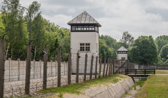 Dachau was fenced and guarded by SS guards. An escape was impossible.