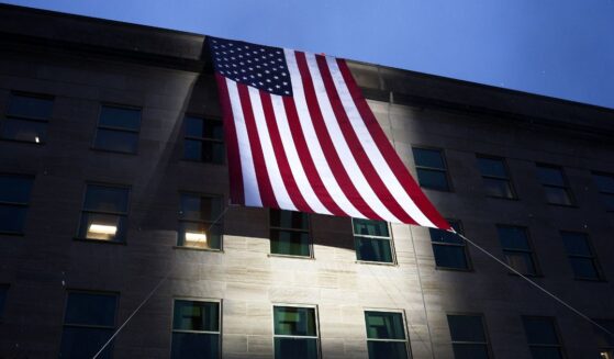 An American flag is unfurled on the side of the Pentagon to mark the 25th anniversary of 9/11 on Sept. 11, 2026, in Arlington, Virginia.