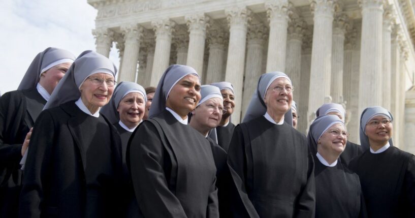 Loraine Marie Maguire, mother provincial of the Little Sisters of the Poor, stands alongside fellow nuns following oral arguments in seven cases dealing with religious organizations that want to ban contraceptives from their health insurance policies on religious grounds at the Supreme Court in Washington, D.C., on March 23, 2016.