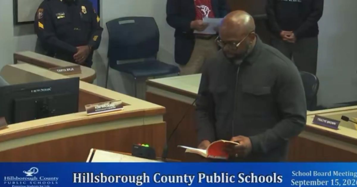 Pastor John K. Amanchukwu Sr. read an explicit school library book during a school board meeting in Hillsborough County, Florida, as shown in video he posted on Sept. 15, 2026.