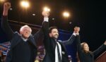 New York Mayor Zohran Mamdani celebrates with Sen. Bernie Sanders and Rep. Alexandria Ocasio-Cortez during an election rally on Oct. 26, 2025, at Forest Hills Stadium in the Queens borough of New York City.