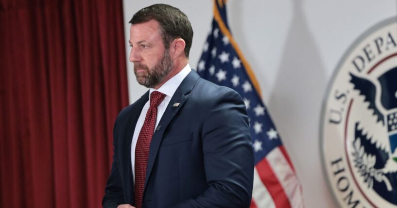 Secretary of Homeland Security Markwayne Mullin stands silently during a press conference at the US Citizenship and Immigration Services field office on Sept. 1, 2026, in New York City.