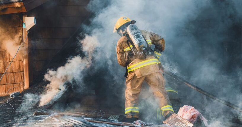 During a fire in Saint-Hugues, Quebec, on the evening of April 25, 2004, firefighters from the municipality as well as neighboring municipalities are battling the blaze.